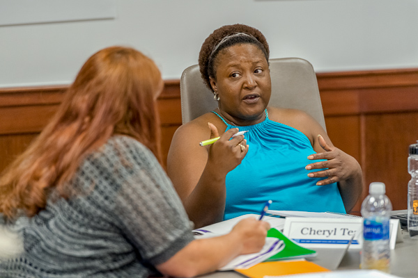 Two women talking in an applied leadership class at MTSU