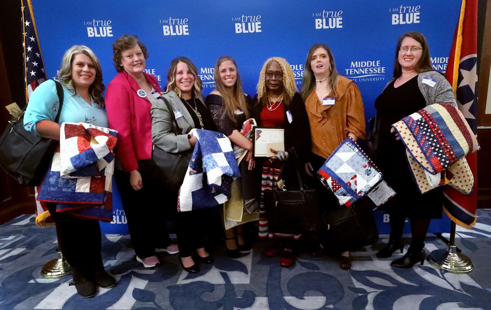 Seven female Veterans left to right Kelley Barnes, Anna Marie Butler, Pat Cooper, Karlie Franks, Anna Mapps-Stanley, Erica McMurray and Christy Sigler were honored Nov. 1, 2022