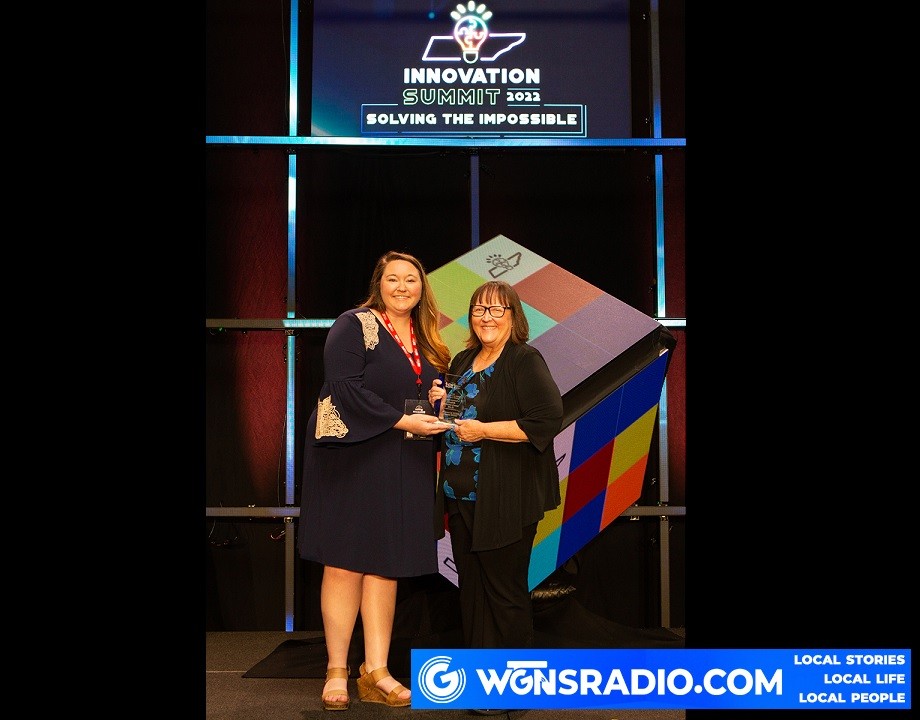 Kristin McQueen, left, a relationship manager with the Tennessee STEM Innovation Network, congratulates MTSU WISTEM Center Director Judith Iriarte-Gross for earning the 2022 TSIN Excellence in Advocacy Award (Tennessee STEM Innovation Network photo by Tina Gionis)