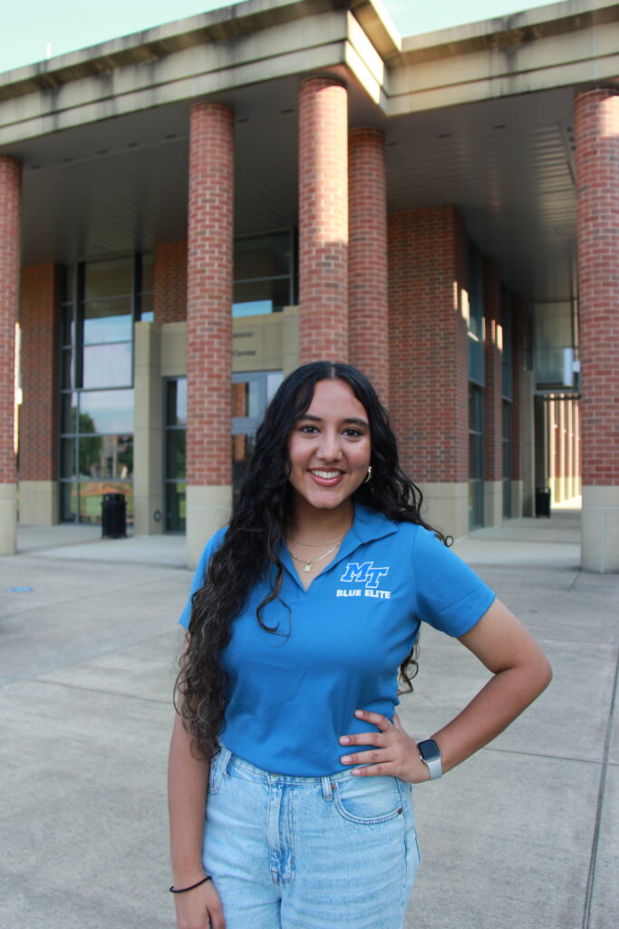 Headshot of our Blue Elite, Alisha Saeed